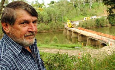 Darryl Stewart with the Tiaro Bridge on the Mary River. Darryl Stewart with the Tiaro Bridge on the Mary River.